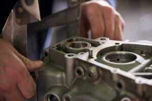 Checking a machined gearbox housing against a straight edge