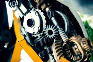 An exposed gear train of bevel and helical gears